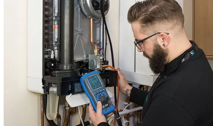 An image of an engineer using a Kane handheld tool