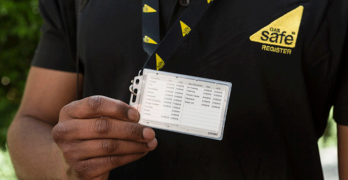 Gas engineer showing his Gas Safe ID card