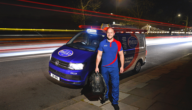 Pimlico Plumbers employee by his van